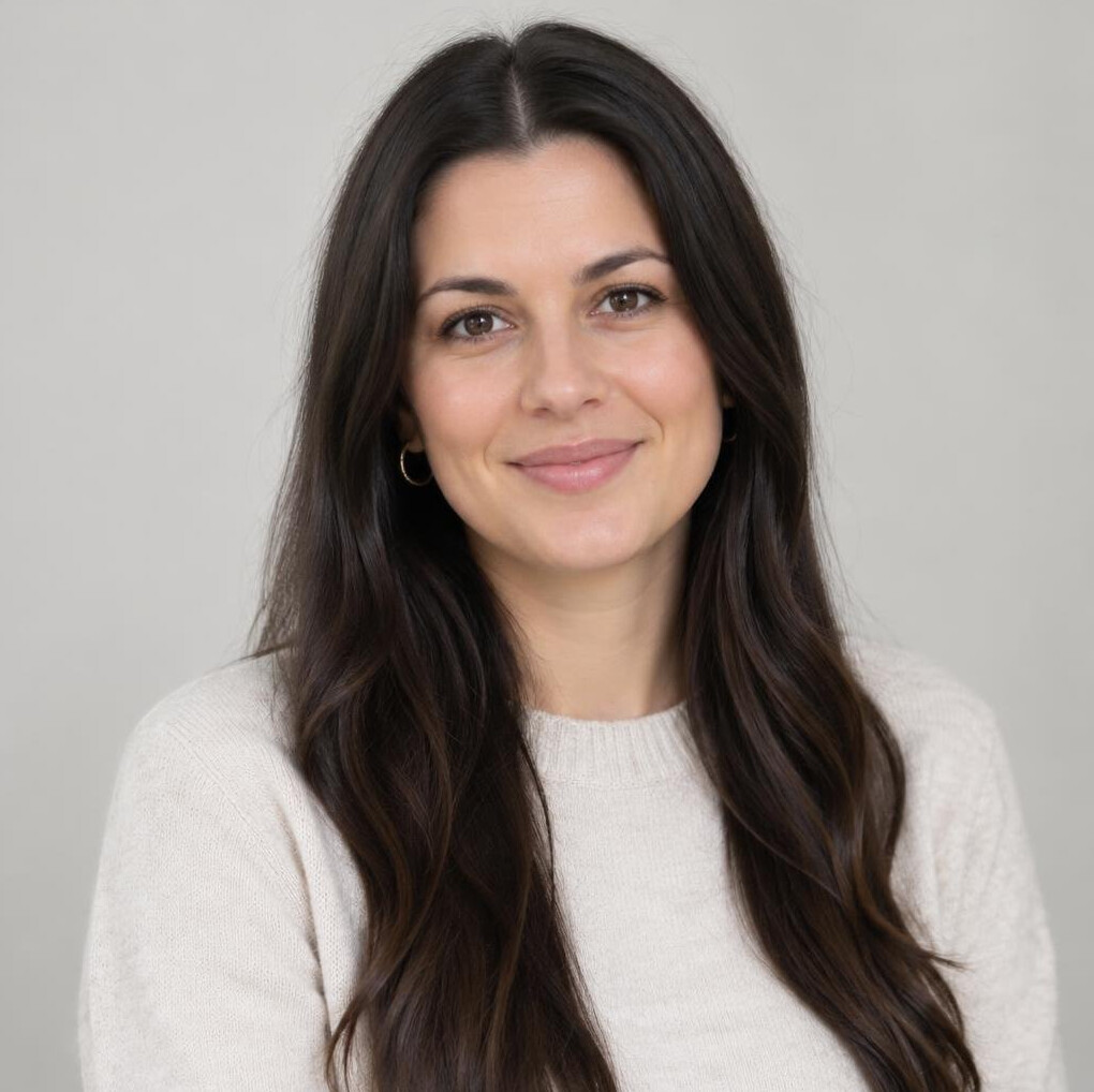 Portrait of a smiling woman with long hair
